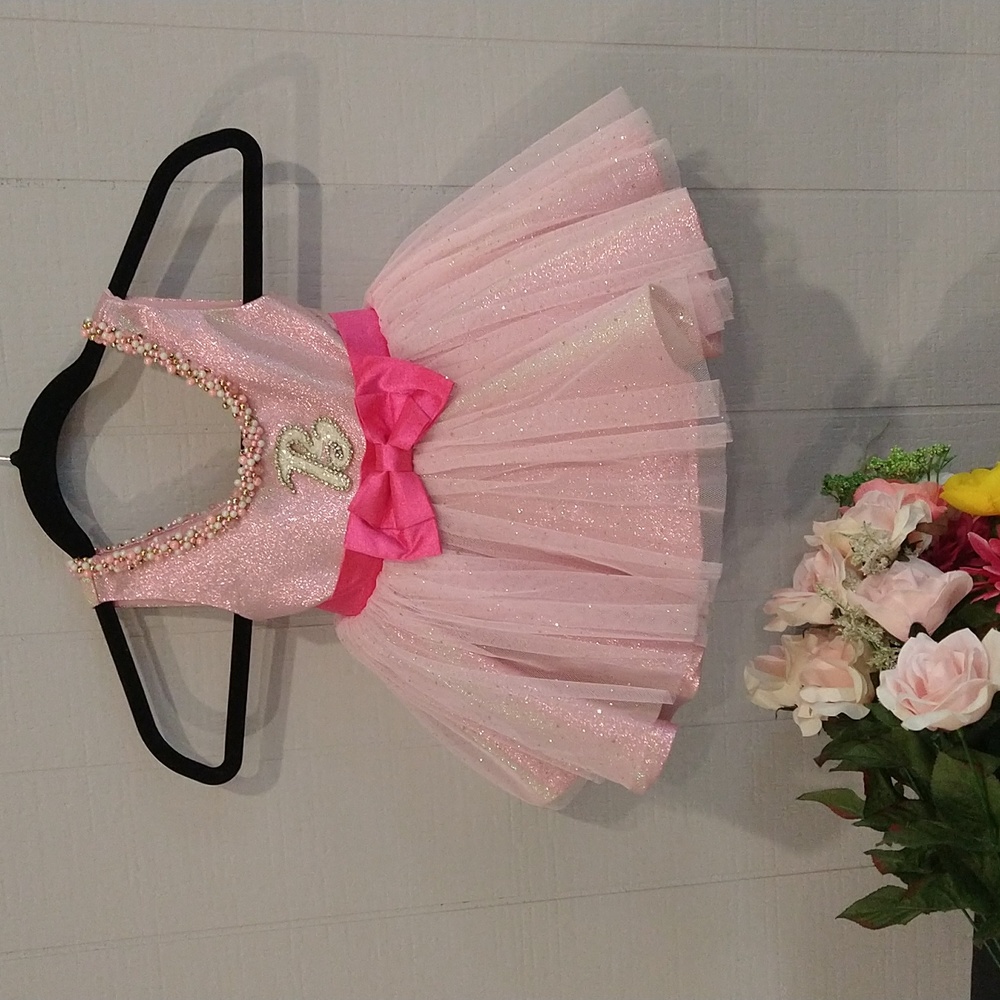 A unique one of a kind barbie dress for baby's for 18 months